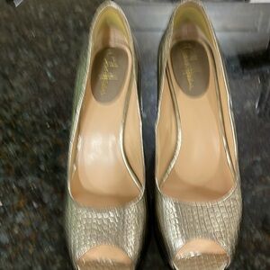 Gold embossed leather Cole Haan heals